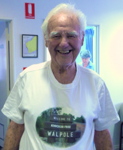 Ever the larrikin, Geordie pops into the Telecentre/CRC wearing an alternative Walpole t-shirt. His great friend and supporter, Dallas Parkes, is hard at work in the background.